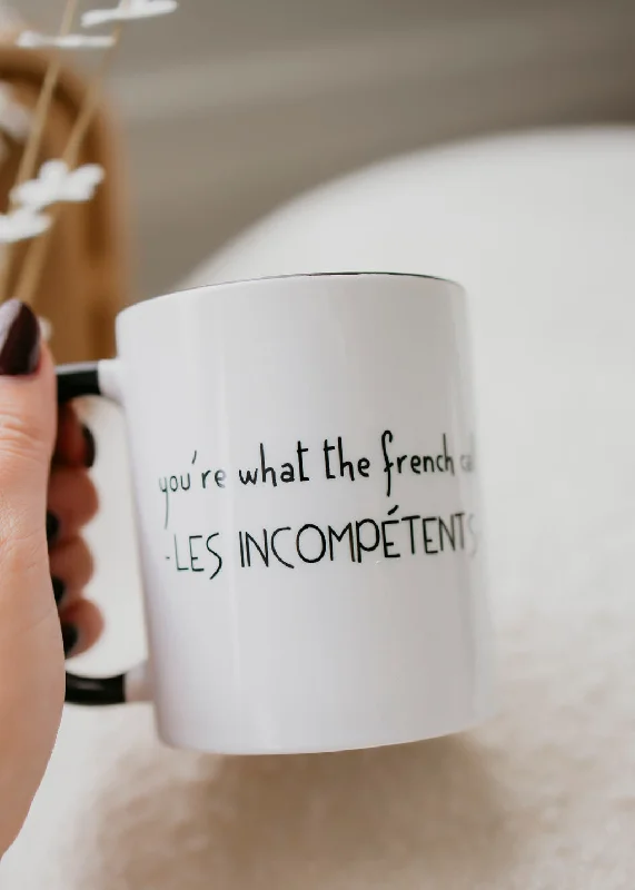 Les Incompetents Mug