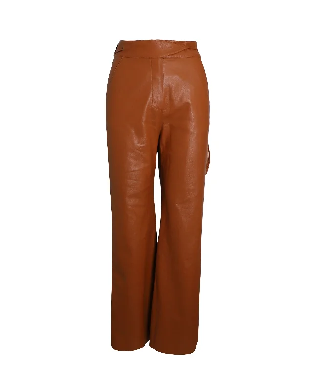 Nanushka Flared-Leg Trousers in Bown Polyurethane